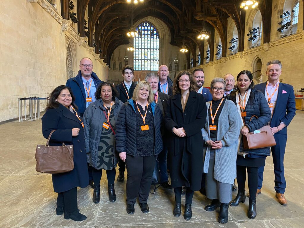 Anjali and the other Sandwell Business Ambassadors inside the Palace of Westminster with MP Sarah Coombes